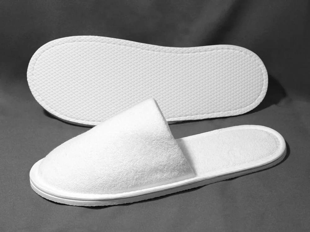 Одноразовые тапочки для гостиниц и отелей  с доставкой из Китая крупным оптом